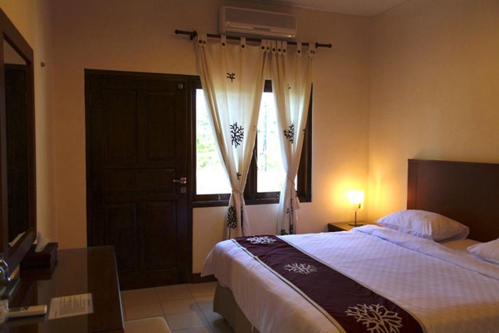 Niramaya Villa Seminyak Pokój zdjęcie